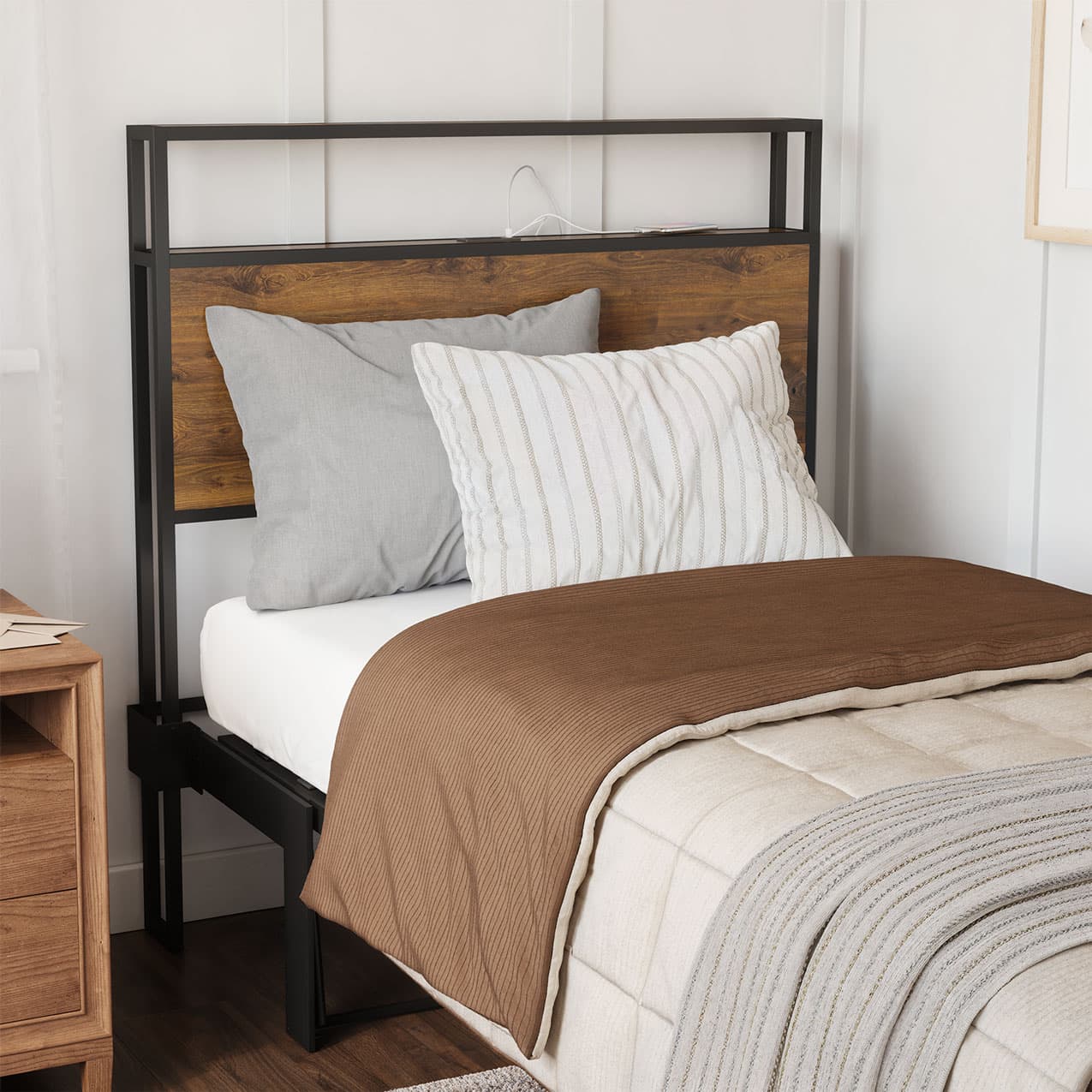 Bed with wooden headboard, pillows, and blankets in a bedroom setting.
bed frame shelf headboard footboard walnut charger charging station panel mahogany black brown bedroom furniture