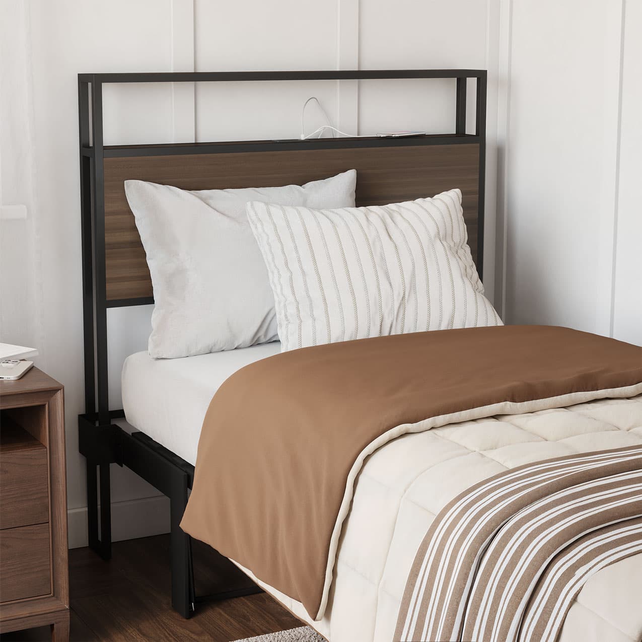 Bed with brown and beige bedding against a white wallbed frame shelf headboard footboard walnut charger charging station panel mahogany black brown bedroom furniture
