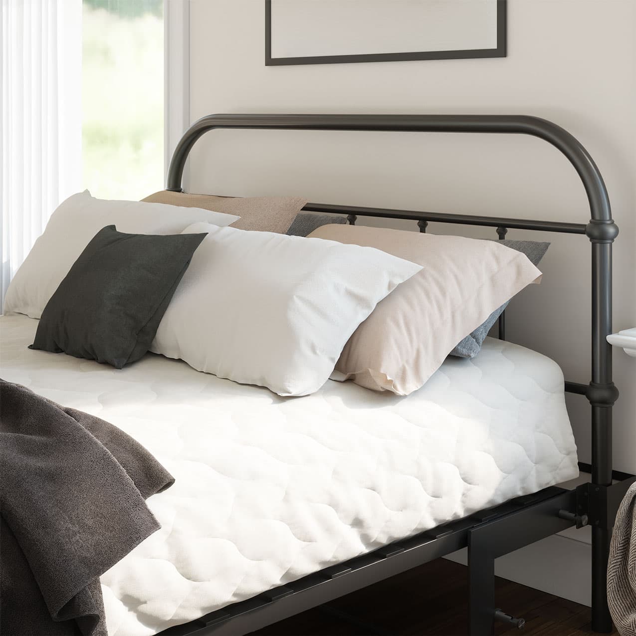 Bed with black metal frame and pillows in a room.
bed frame with headboard footboard lift bed storage lift up bedroom furniture risers space-saving black metal