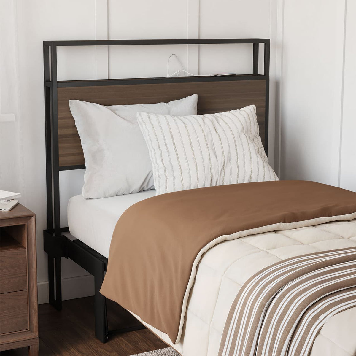 Bed with brown and beige bedding against a white wallbed frame shelf headboard footboard walnut charger charging station panel mahogany black brown bedroom furniture
