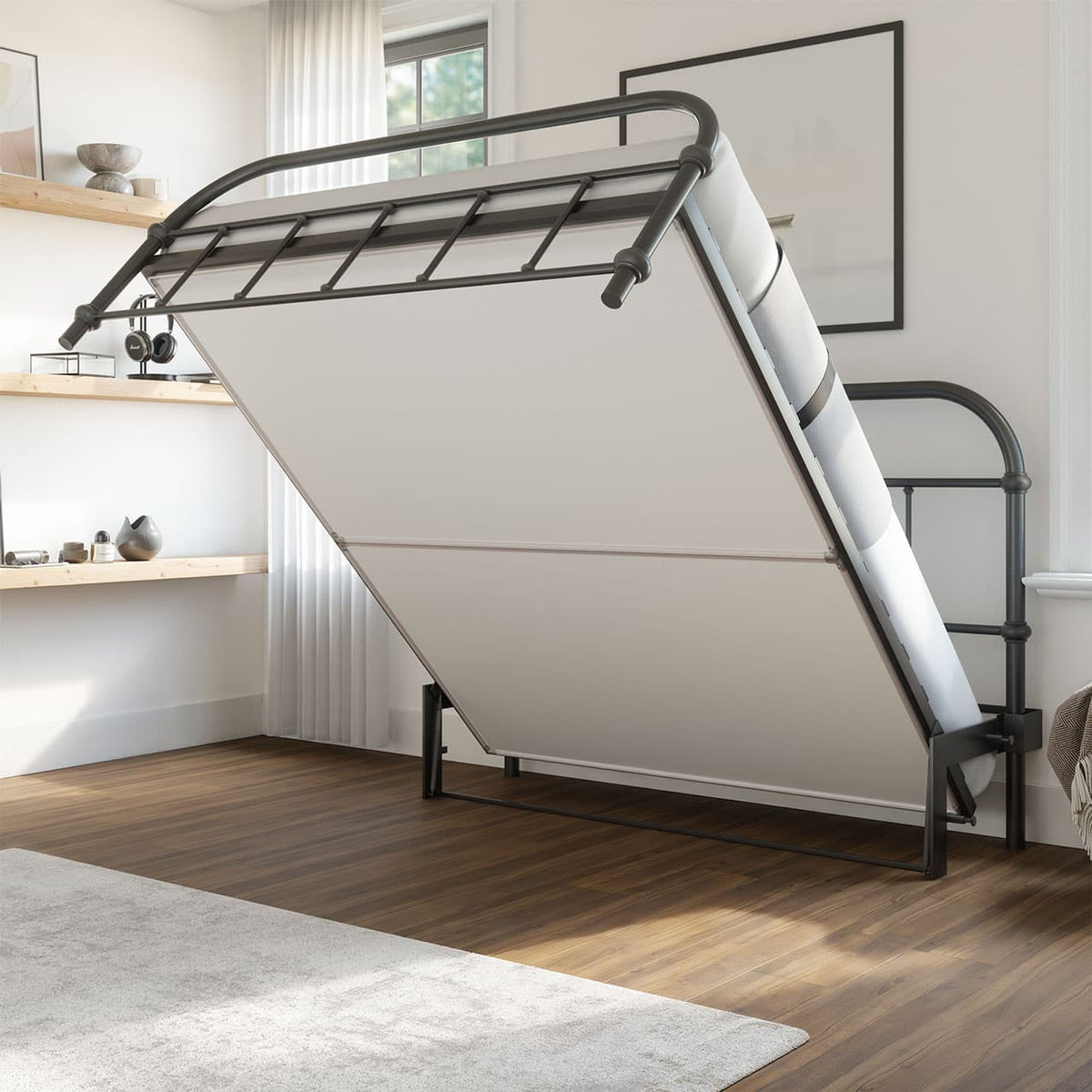 Liftable bed frame in a room with wooden floor and rug. 
bed frame with headboard footboard lift bed storage lift up bedroom furniture risers space-saving black metal 